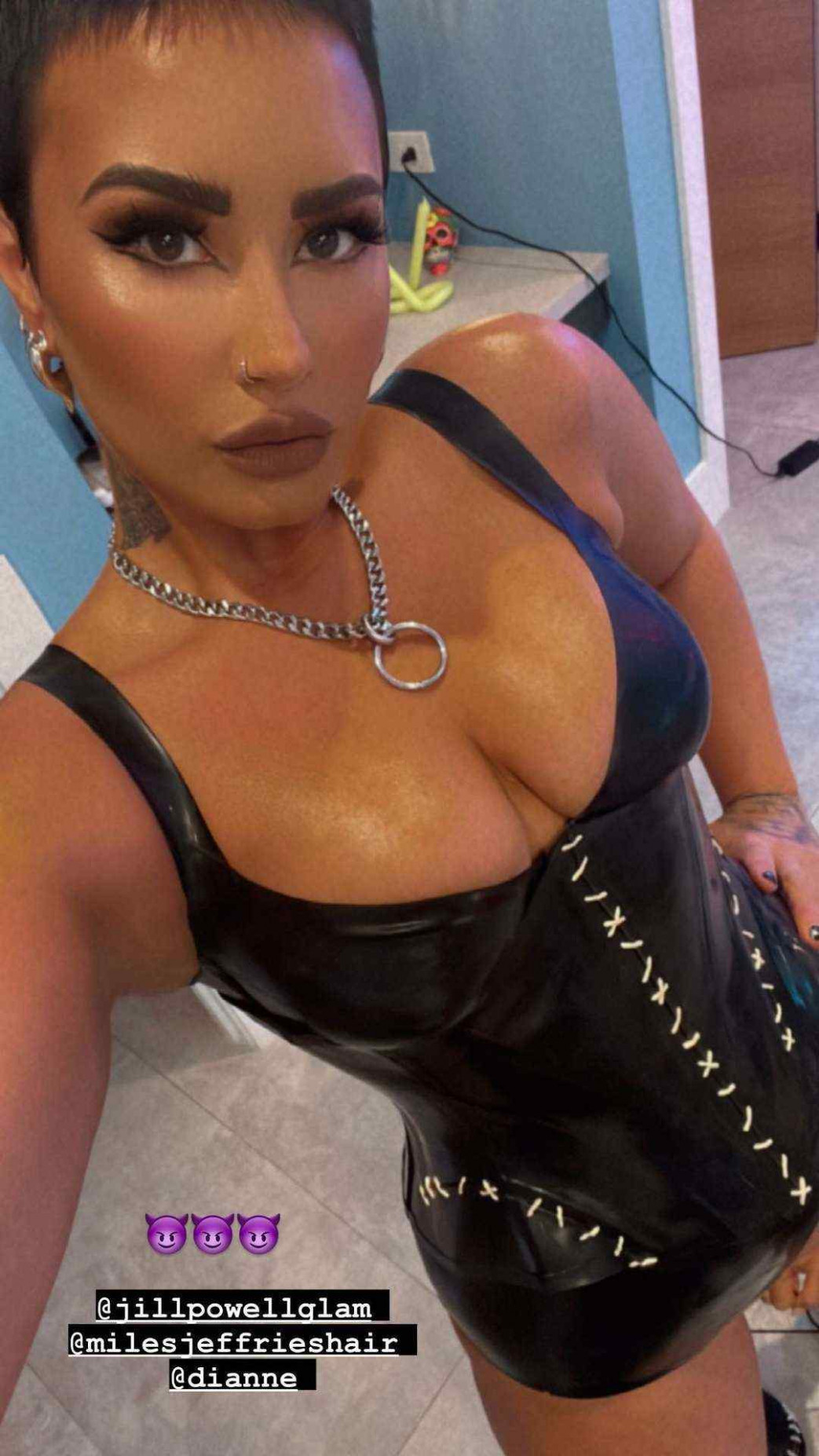 Demi-Lovato-Cleavage-in-Leather-1.jpg